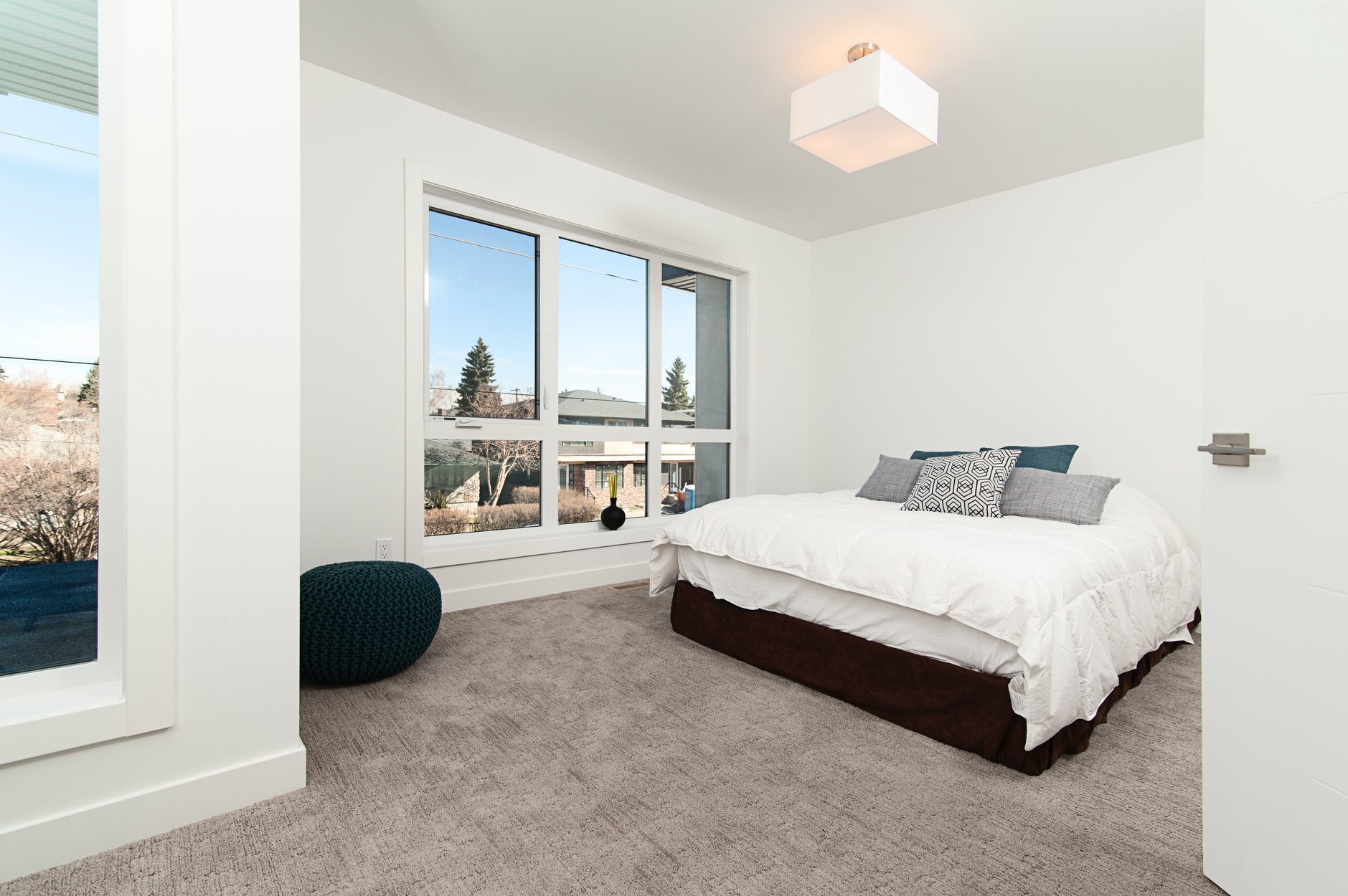 hero section for cabinets page. Shows a white kitchen with tile backsplash