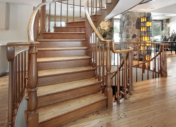Hardwood staircase and railing.