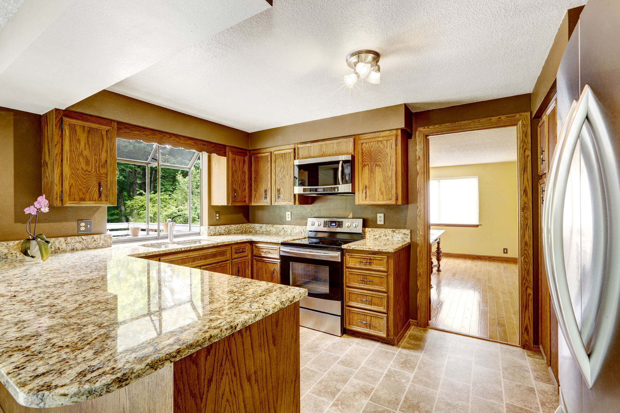 quartz kitchen with brown cabinets