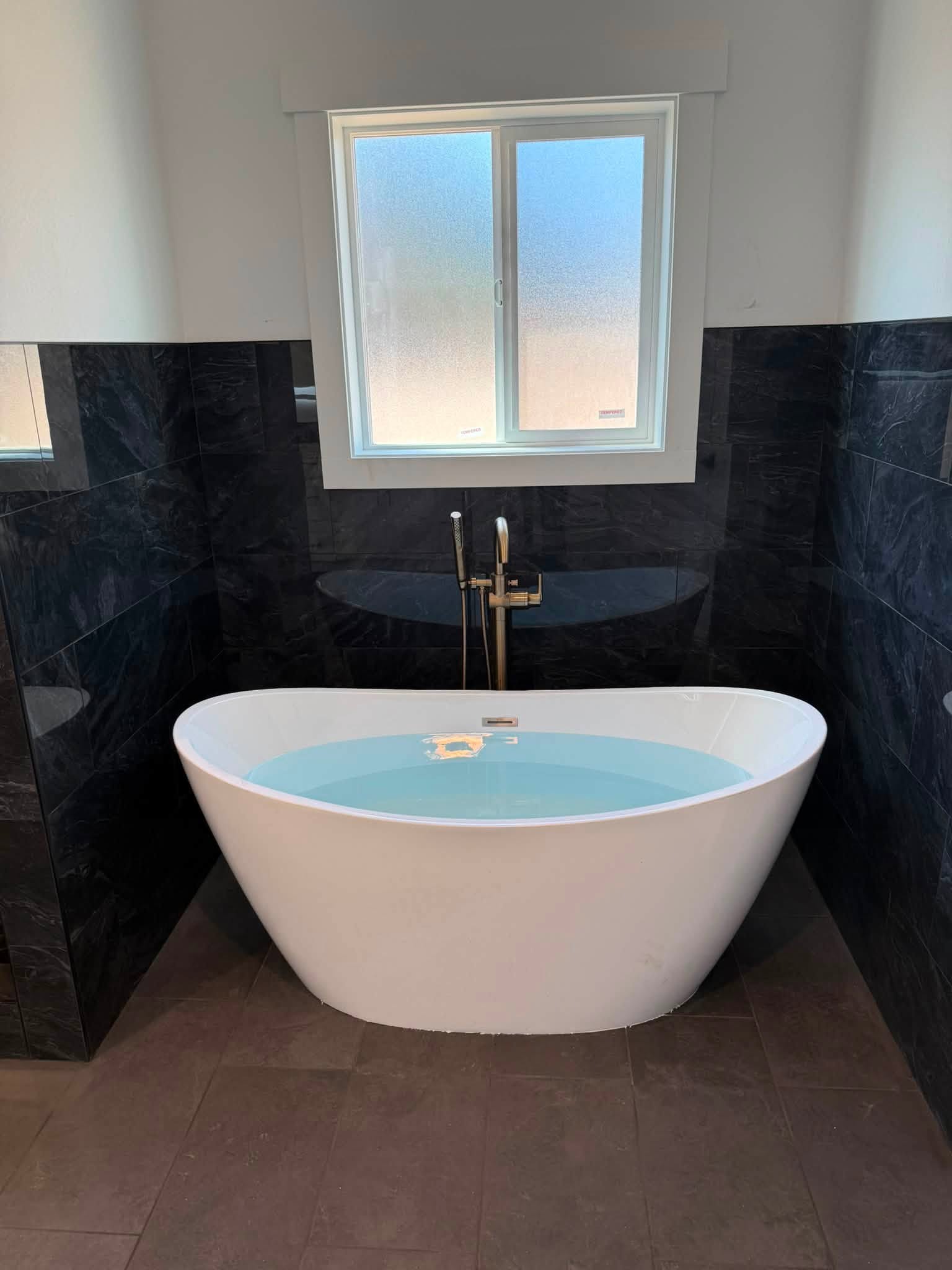 with Blue Shaker and Whiter Shaker Cabinets and Floretta Eloquence Countertops